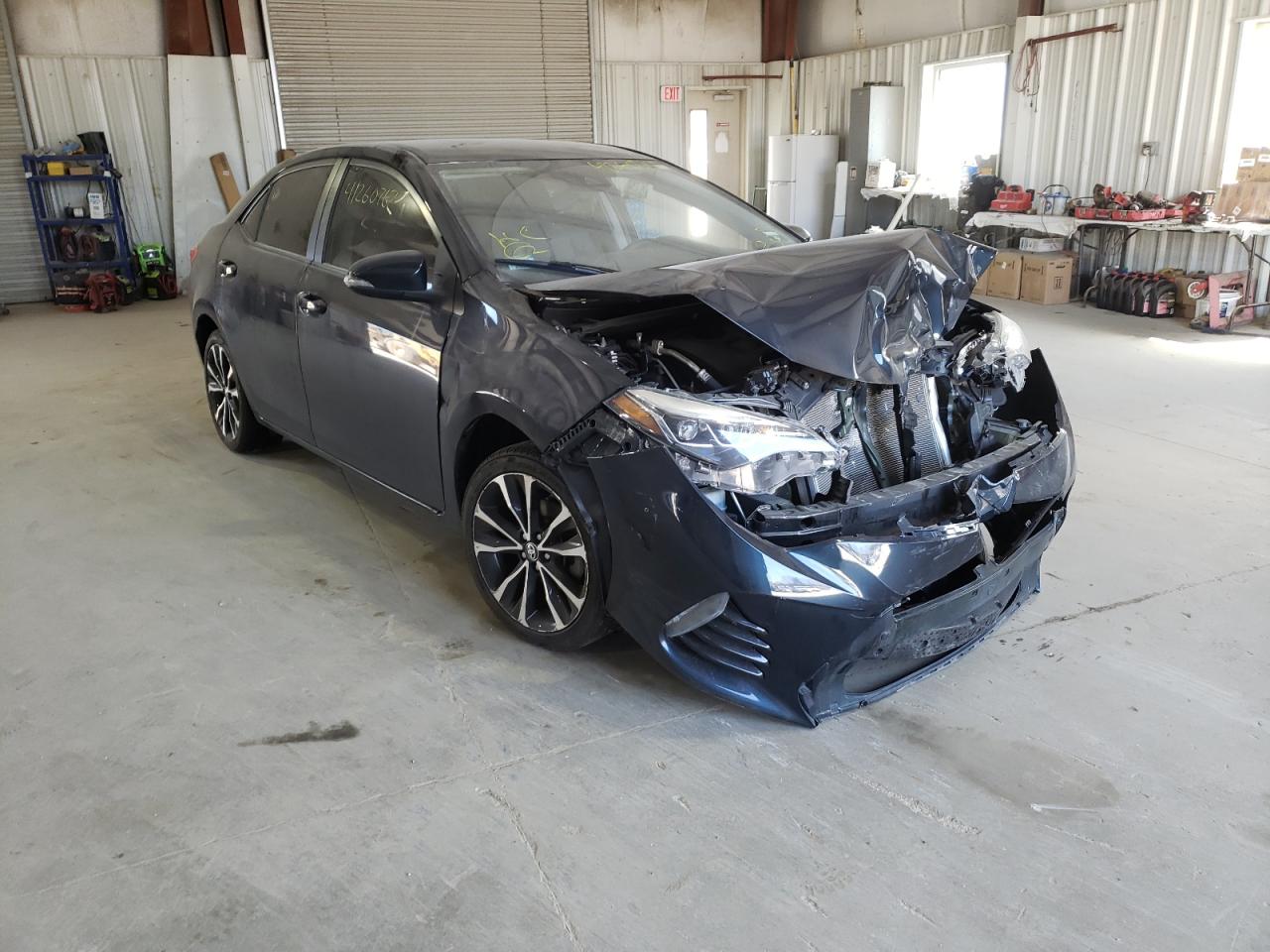 TOYOTA COROLLA L 2018 with VIN 5YFBURHE2JP779670 - Photo from auction