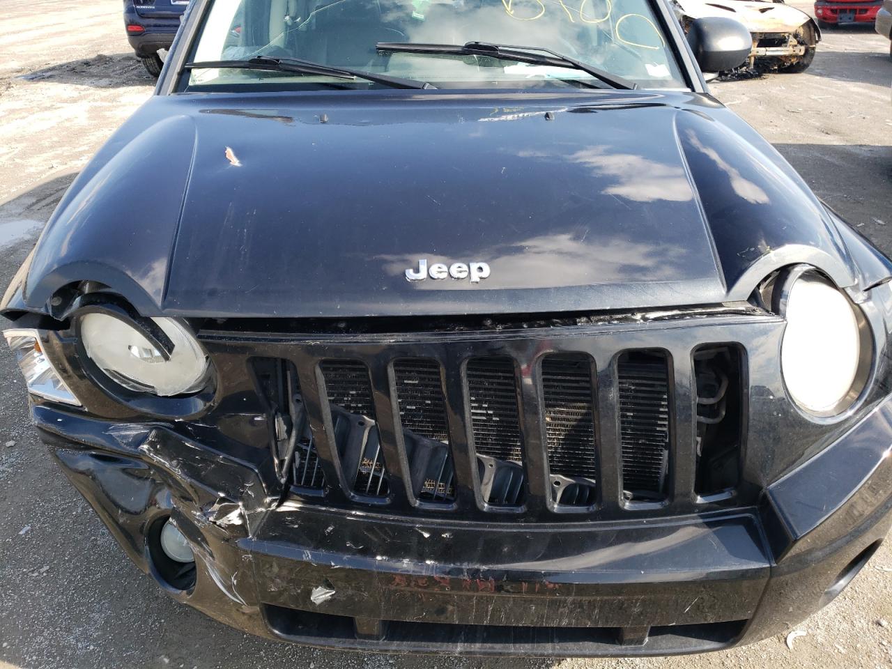 Photo 7 from auction – 2007 JEEP COMPASS LI with VIN 1J8FF57W87D144858