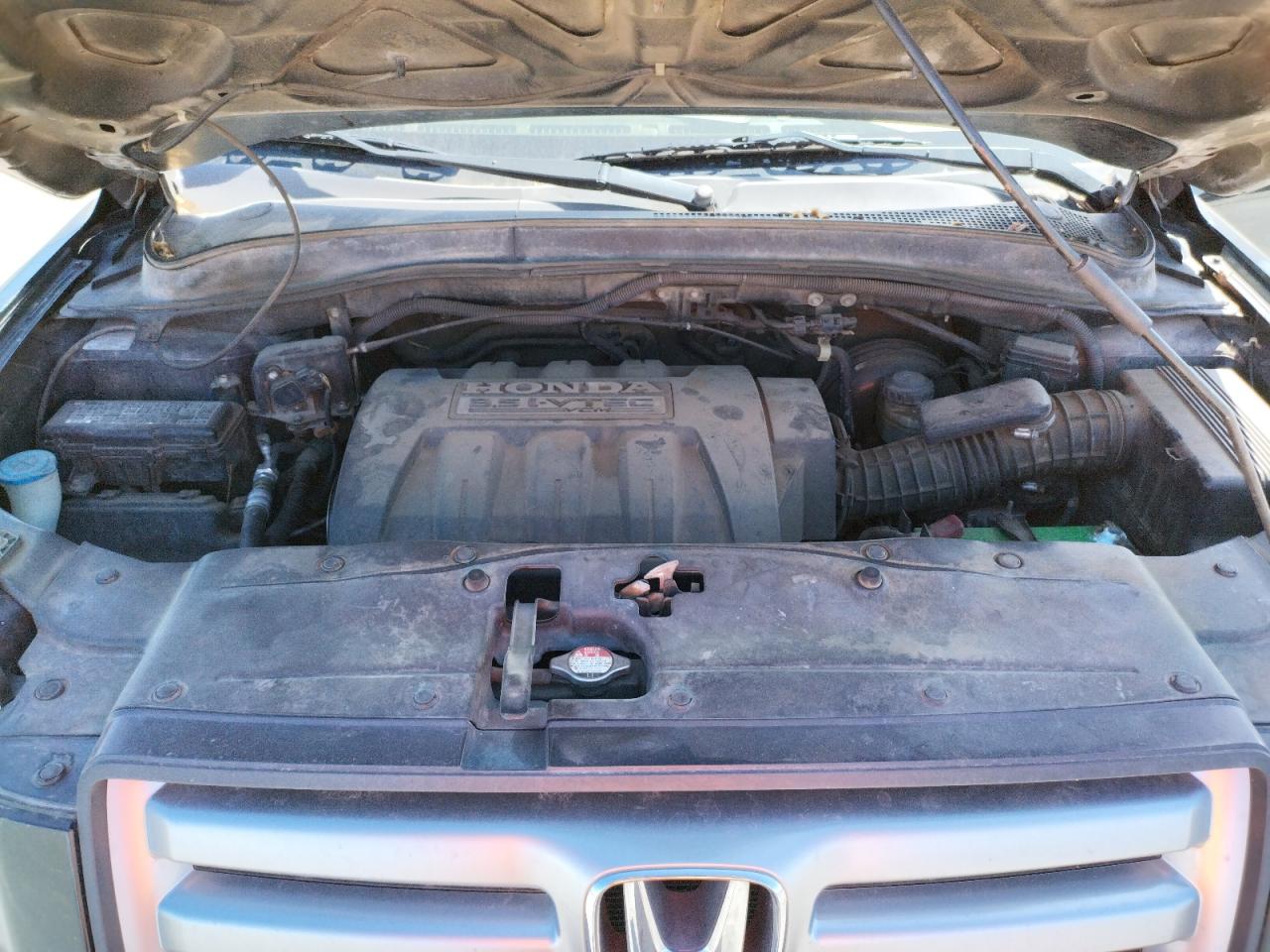 Photo 7 from auction – 2007 HONDA PILOT LX with VIN 5FNYF28157B034084