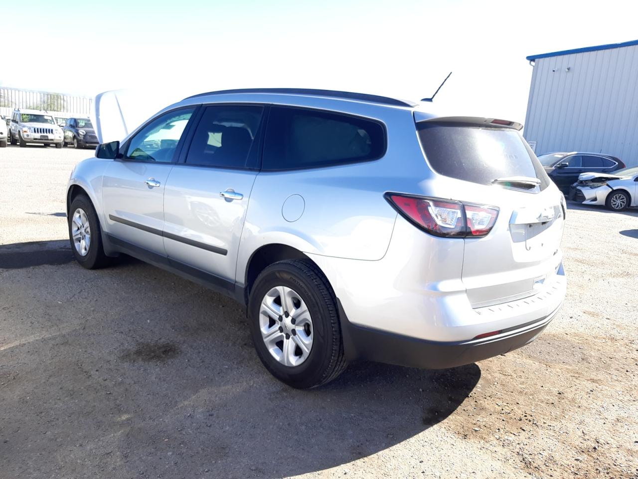 Photo 3 from auction – 2013 CHEVROLET TRAVERSE L with VIN 1GNKRFED0DJ129330