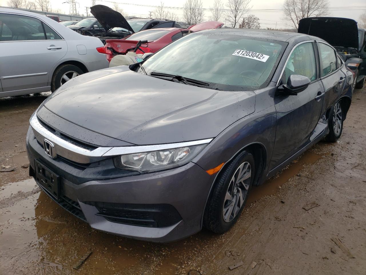 Photo 2 from auction – 2018 HONDA CIVIC EX with VIN 2HGFC2F74JH593071