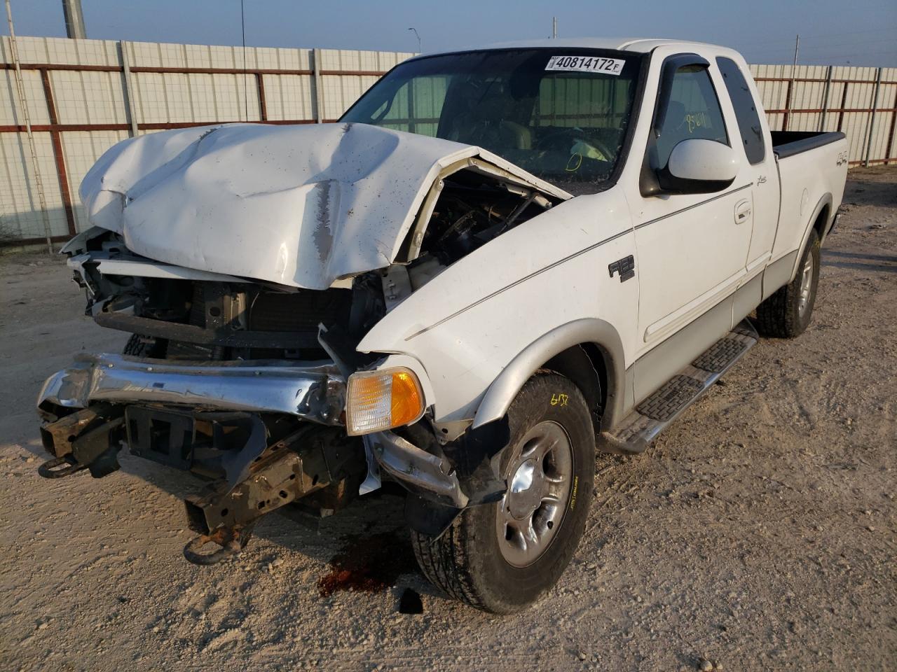 Photo 2 from auction – 2002 FORD F150 with VIN 1FTRX18L32NA00040