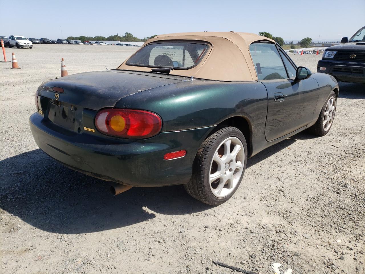 Photo 4 from auction – 1999 MAZDA MX-5 MIATA with VIN JM1NB3530X0127121