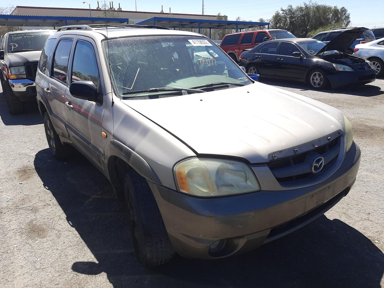 MAZDA TRIBUTE LX 2002 with VIN 4F2YU09132KM19762 - Photo from auction