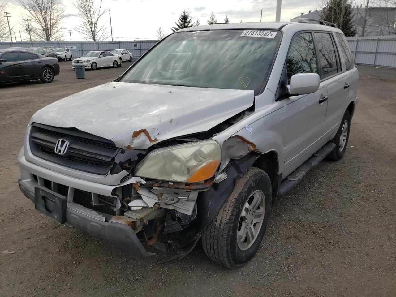 Photo 2 from auction – 2004 HONDA PILOT EX with VIN 2HKYF18454H574990