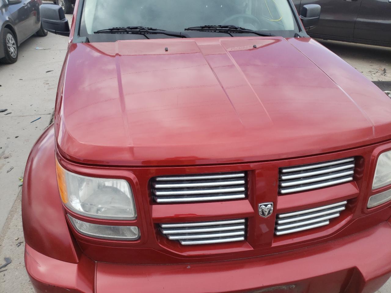 Photo 9 from auction – 2010 DODGE NITRO HEAT with VIN 1D4PT4GK7AW174136