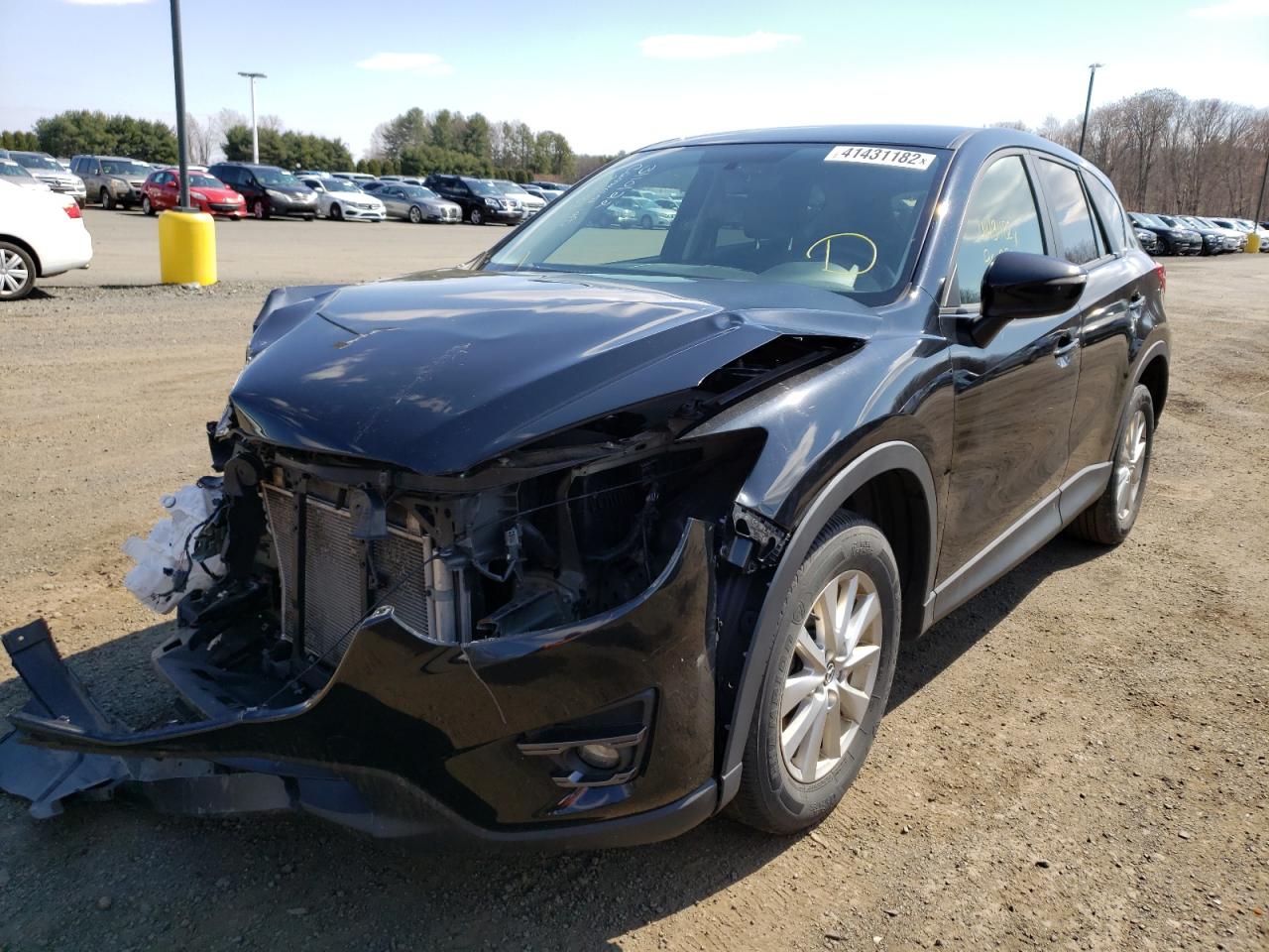 Photo 2 from auction – 2016 MAZDA CX-5 TOURI with VIN JM3KE4CY0G0819983