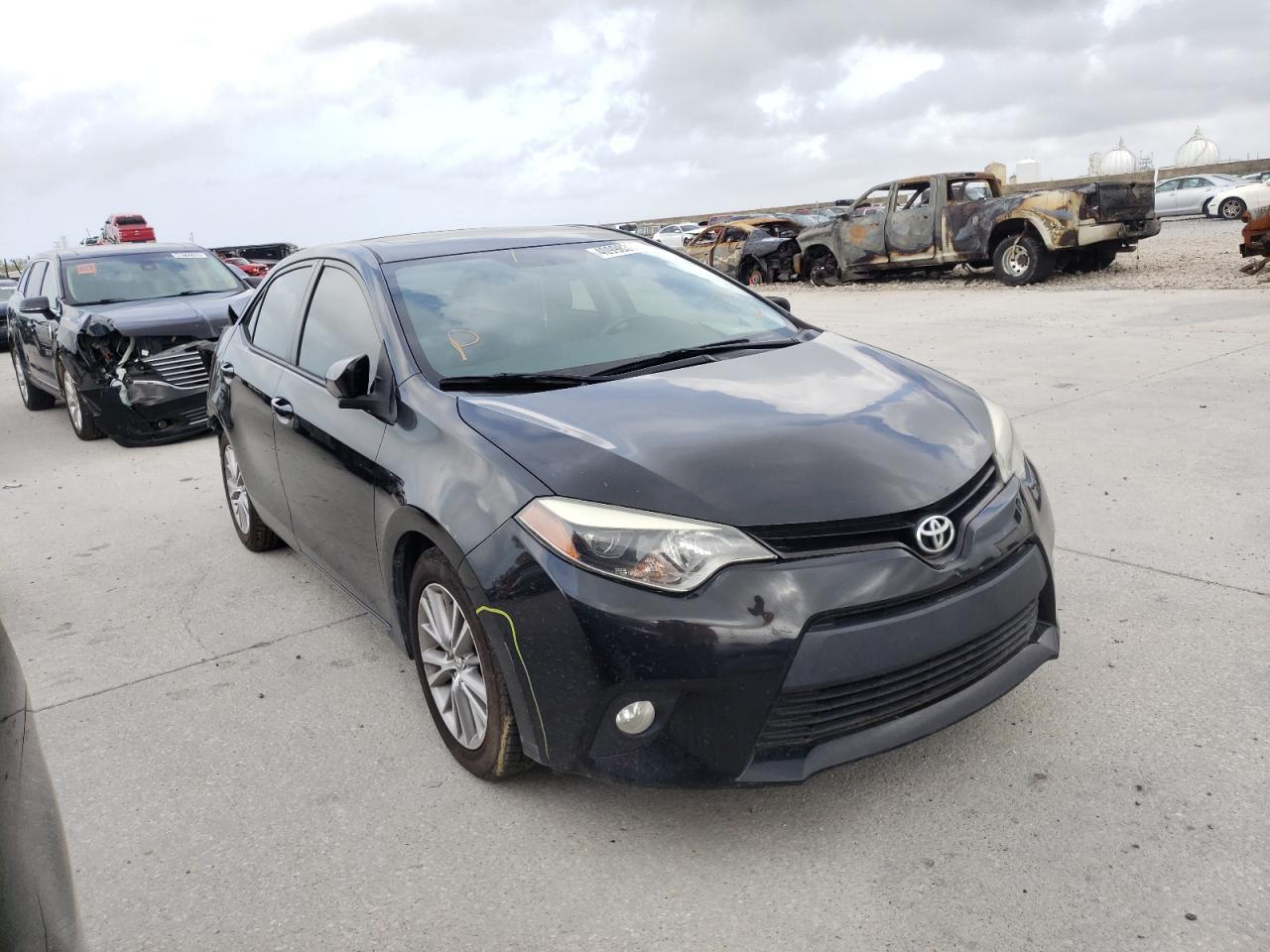 TOYOTA COROLLA L 2014 with VIN 5YFBURHE2EP141554 - Photo from auction