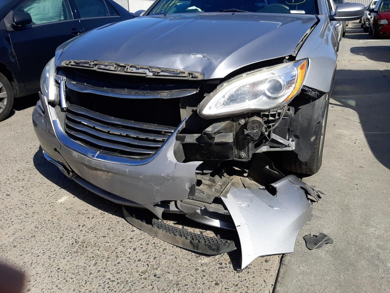Photo 9 from auction – 2014 CHRYSLER 200 LX with VIN 1C3CCBAB1EN206717