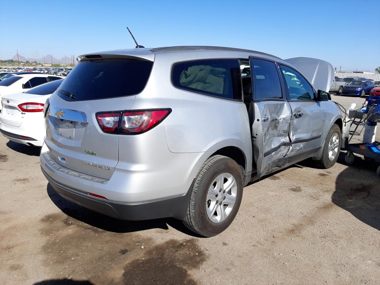 Photo 4 from auction – 2013 CHEVROLET TRAVERSE L with VIN 1GNKRFED0DJ129330