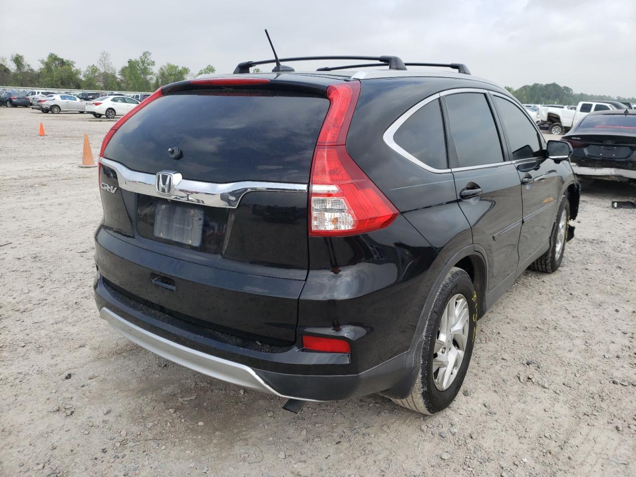 Photo 4 from auction – 2016 HONDA CR-V EXL with VIN 2HKRM3H75GH513370