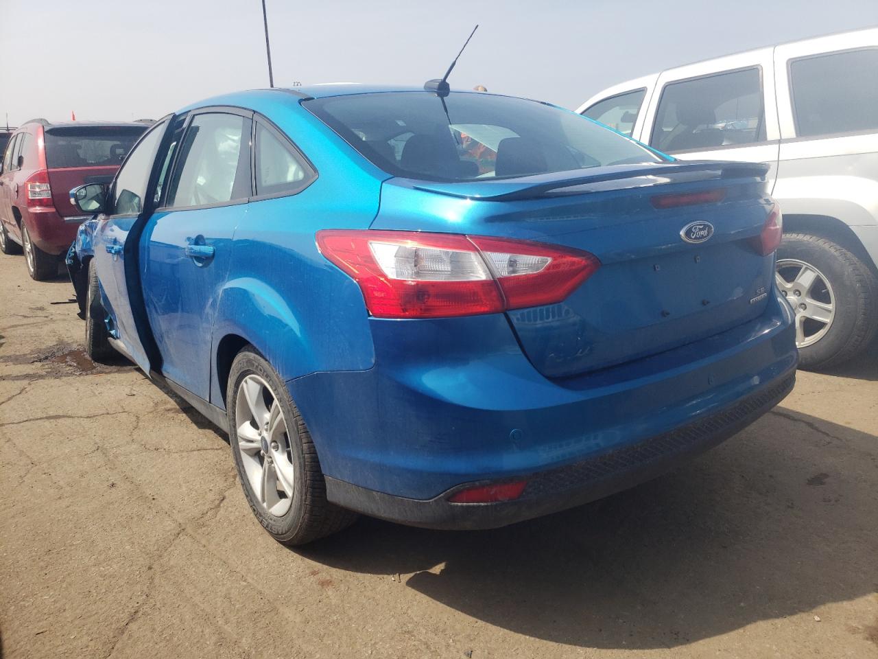 Photo 3 from auction – 2014 FORD FOCUS SE with VIN 1FADP3F23EL404977