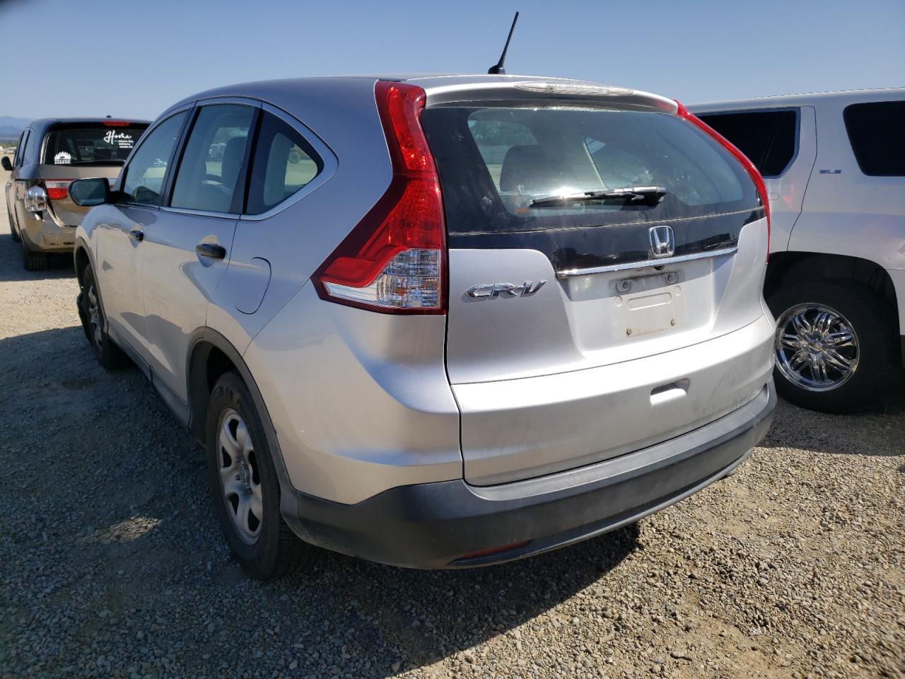 Photo 3 from auction – 2014 HONDA CR-V LX with VIN 2HKRM3H30EH550658