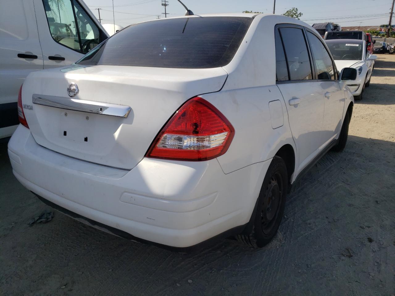 Photo 4 from auction – 2009 NISSAN VERSA with VIN 3N1BC11E09L406590
