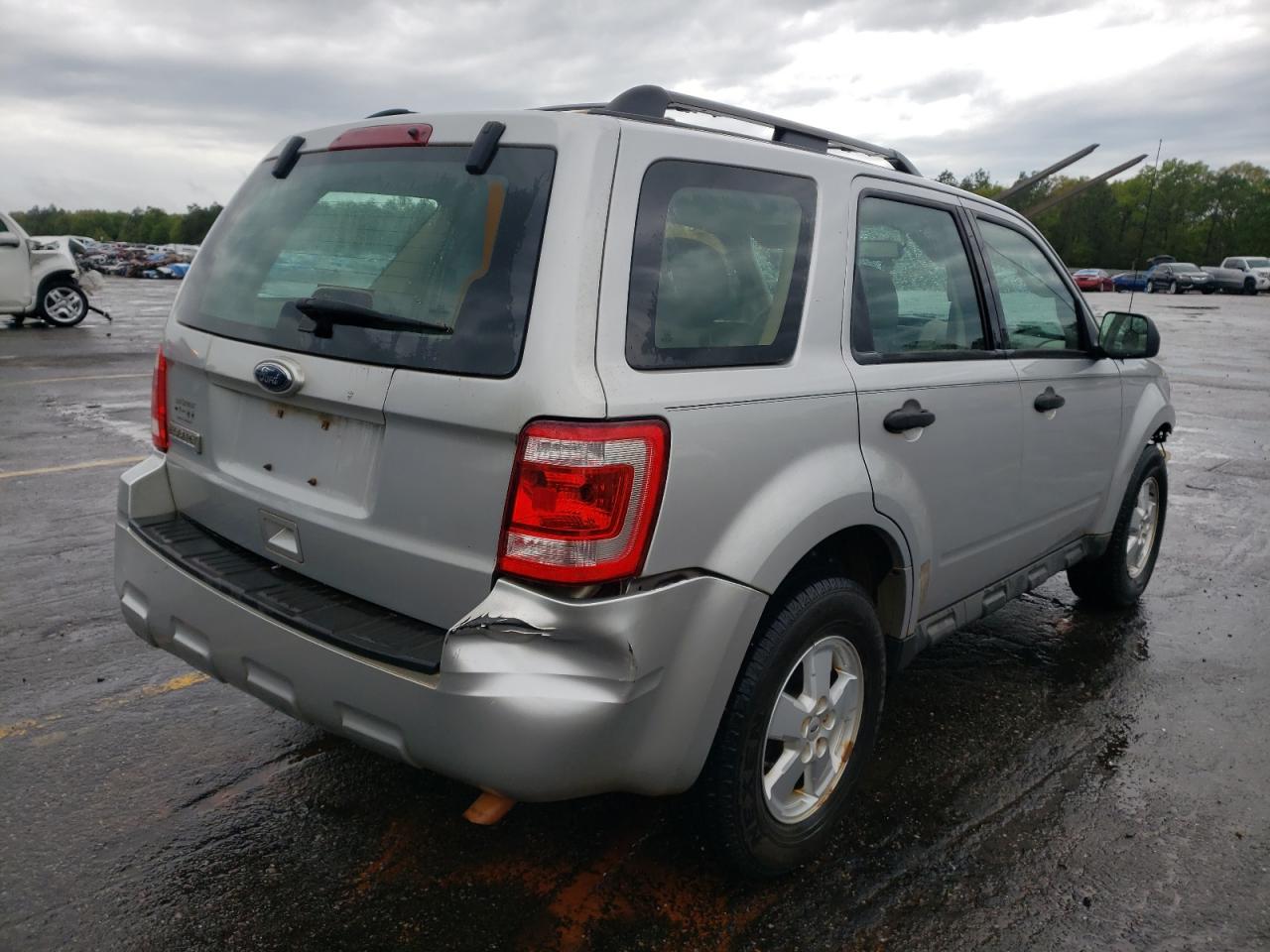 Photo 4 from auction – 2010 FORD ESCAPE XLS with VIN 1FMCU0C79AKB34470