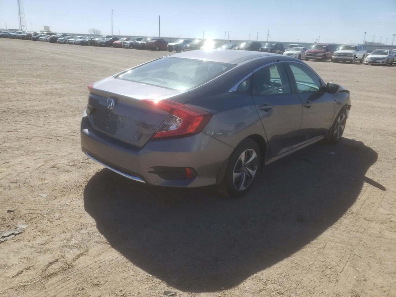 Photo 4 from auction – 2019 HONDA CIVIC LX with VIN 19XFC2F69KE030360