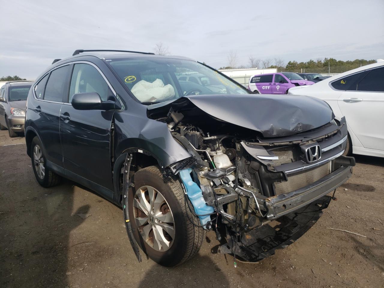 HONDA CR-V EXL 2014 with VIN 2HKRM4H77EH692076 - Photo from auction