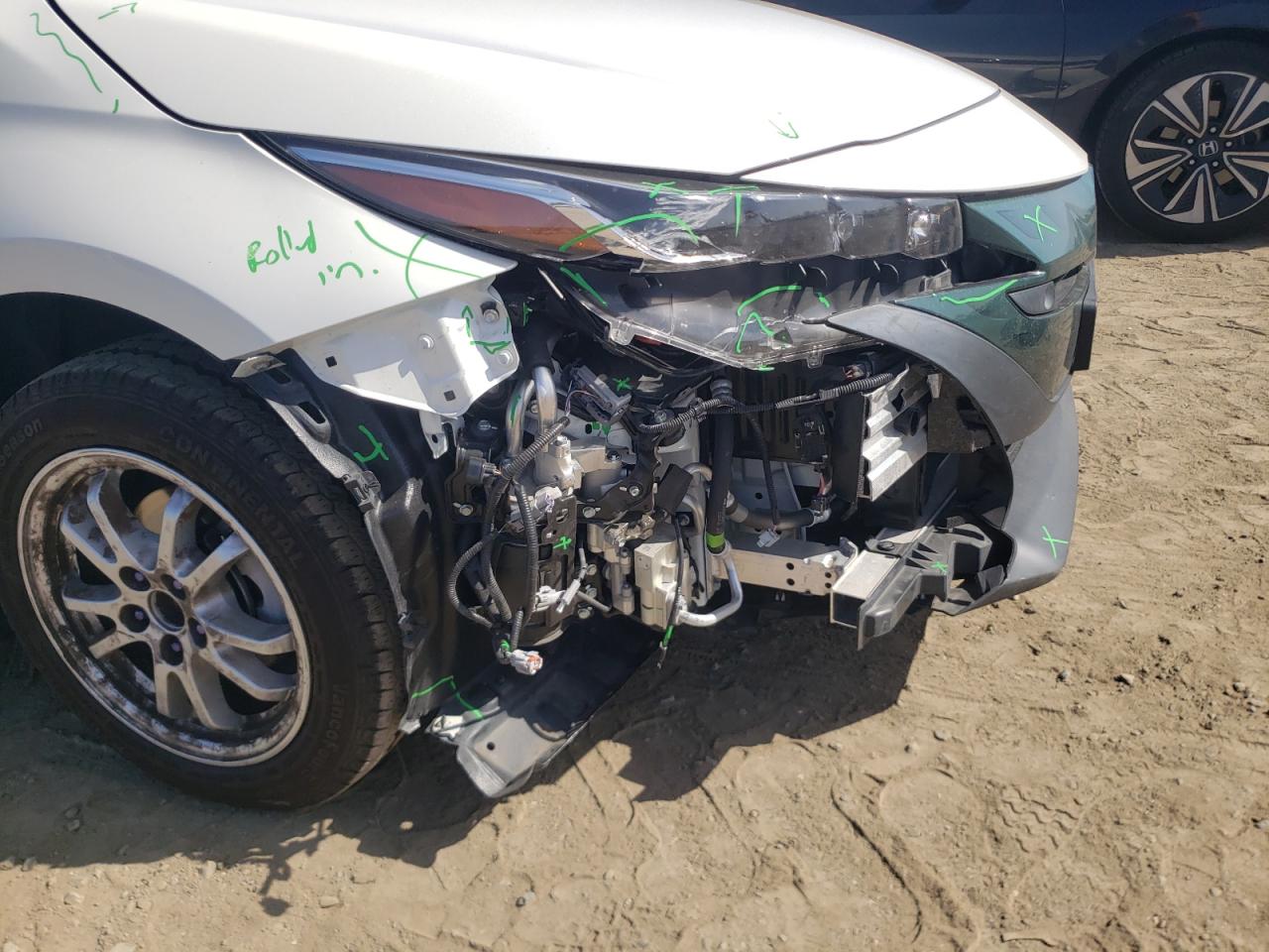 Photo 9 from auction – 2017 TOYOTA PRIUS PRIM with VIN JTDKARFP2H3053176