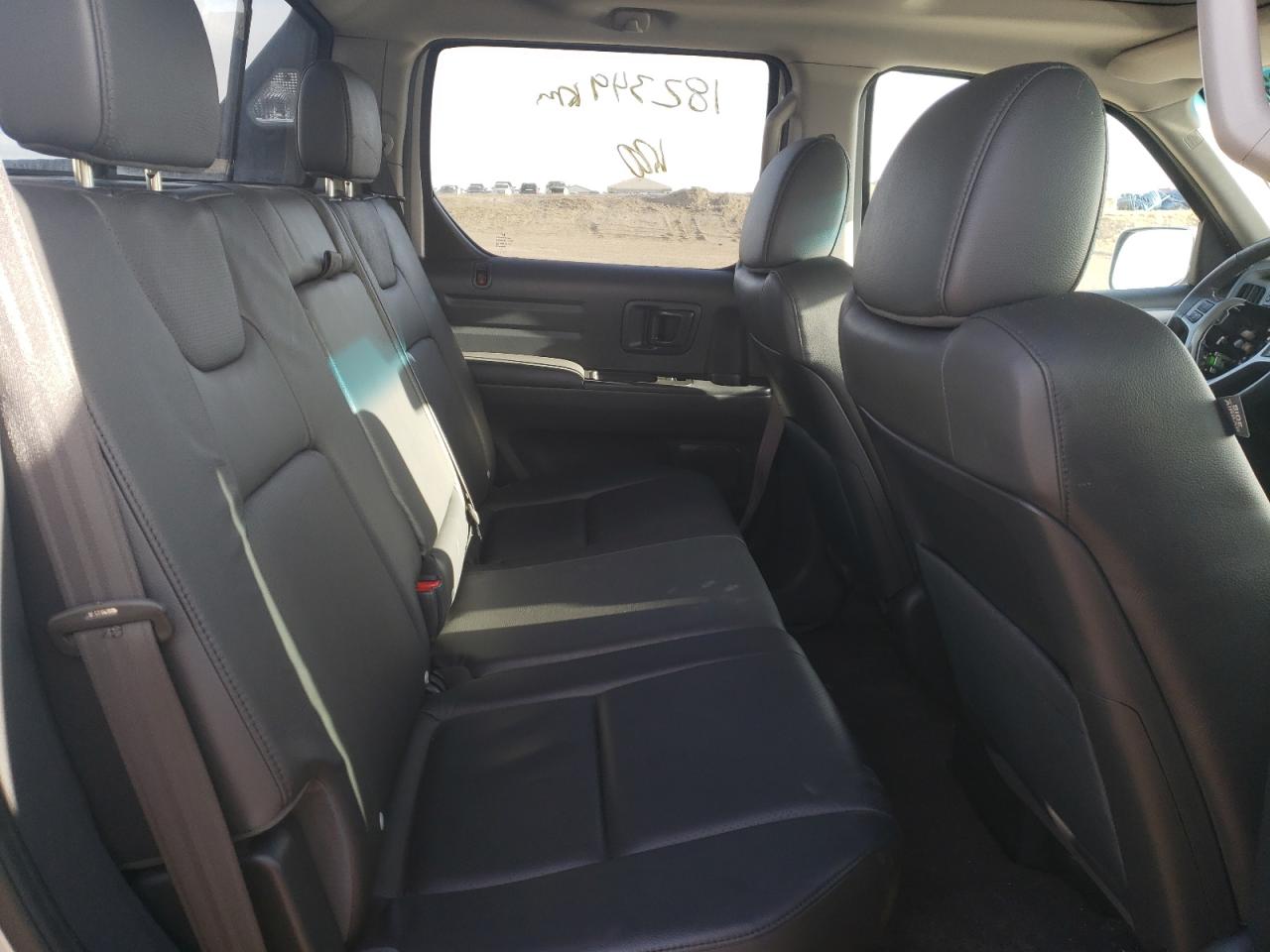 Photo 6 from auction – 2013 HONDA RIDGELINE with VIN 5FPYK1F59DB501926