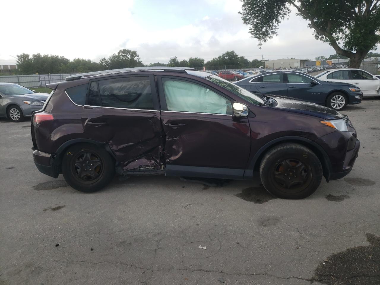 Photo 9 from auction – 2018 TOYOTA RAV4 LE with VIN 2T3ZFREV0JW438674