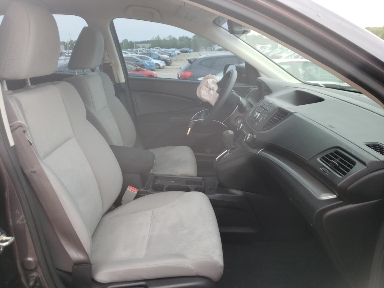 Photo 5 from auction – 2016 HONDA CR-V LX with VIN 5J6RM4H37GL005944