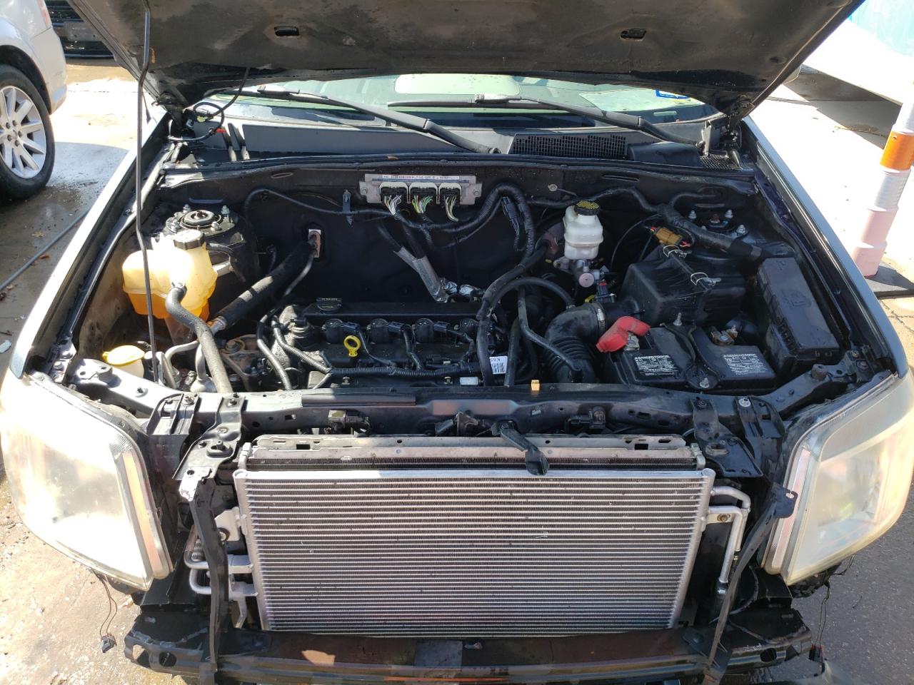 Photo 7 from auction – 2010 MERCURY MARINER with VIN 4M2CN8B78AKJ03058