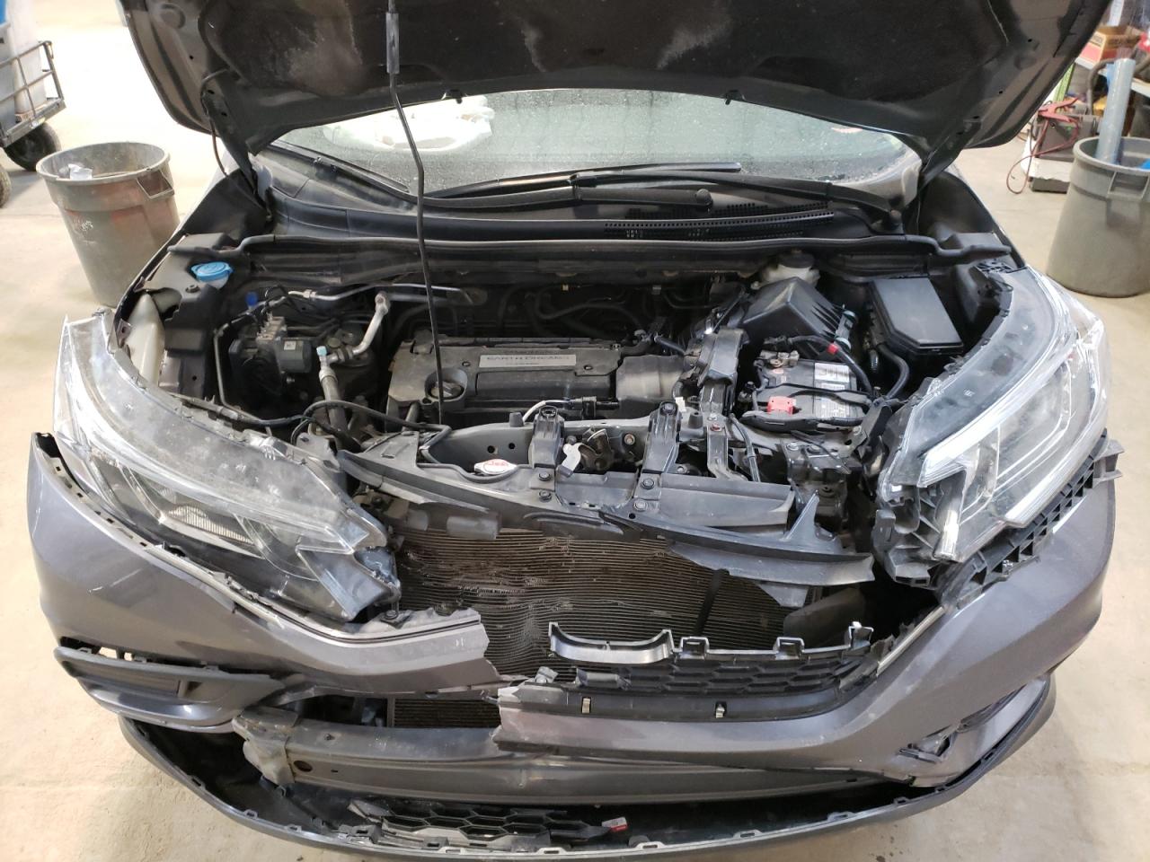 Photo 7 from auction – 2015 HONDA CR-V LX with VIN 2HKRM4H33FH116449