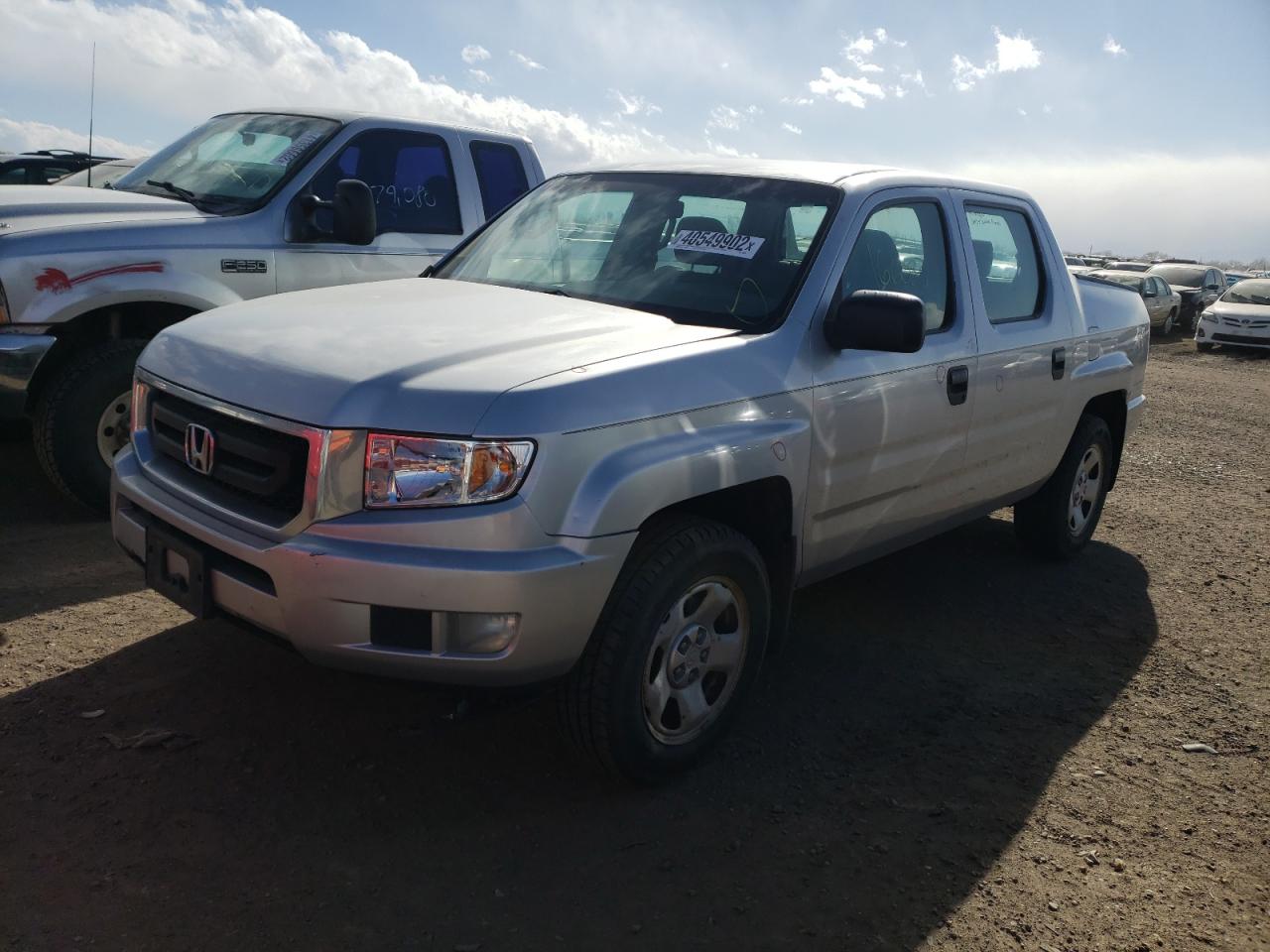 Photo 2 from auction – 2010 HONDA RIDGELINE with VIN 5FPYK1F22AB003763