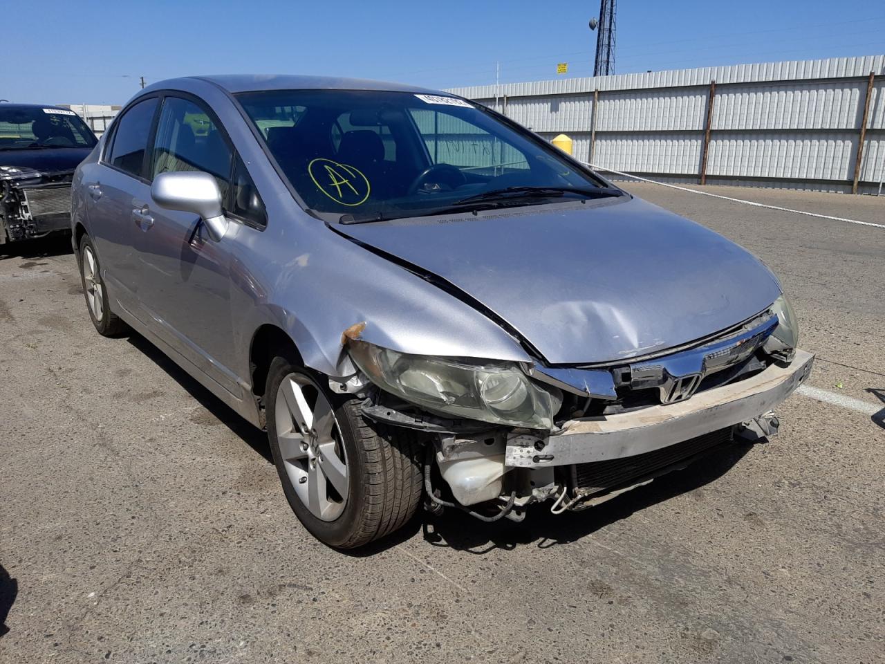 HONDA CIVIC LX-S 2010 with VIN 19XFA1F64AE008569 - Photo from auction