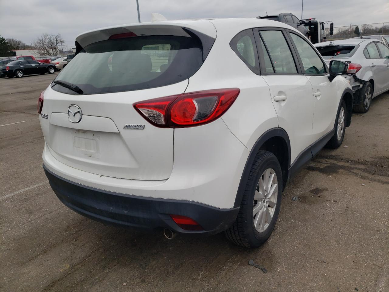 Photo 4 from auction – 2014 MAZDA CX-5 SPORT with VIN JM3KE2BEXE0342746
