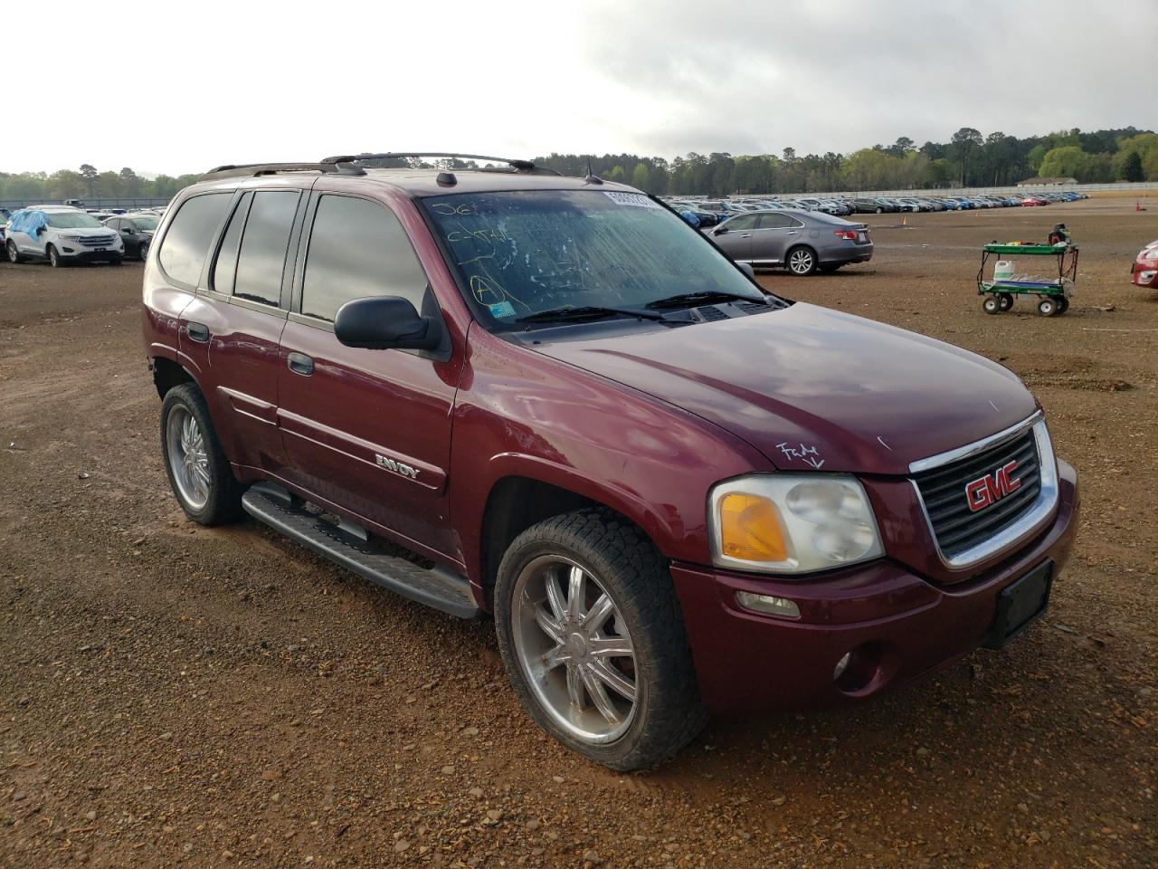 GMC ENVOY 2005 with VIN 1GKDT13SX52225277 - Photo from auction