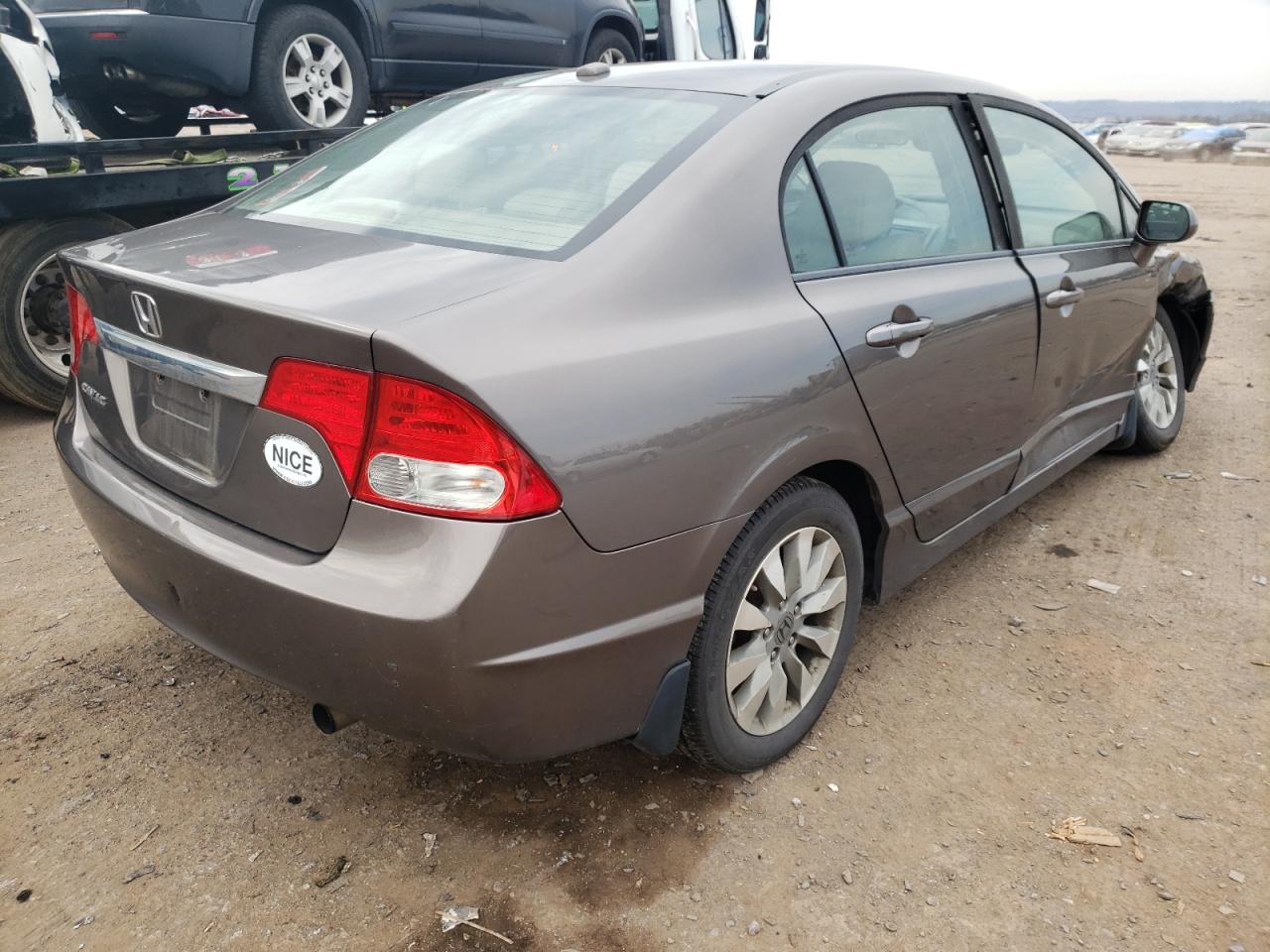 Photo 4 from auction – 2010 HONDA CIVIC EXL with VIN 19XFA1F98AE007063