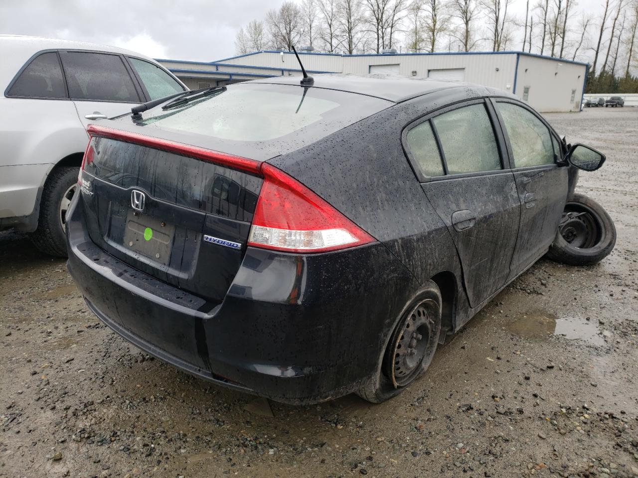 Photo 4 from auction – 2010 HONDA INSIGHT LX with VIN JHMZE2H56AS037448