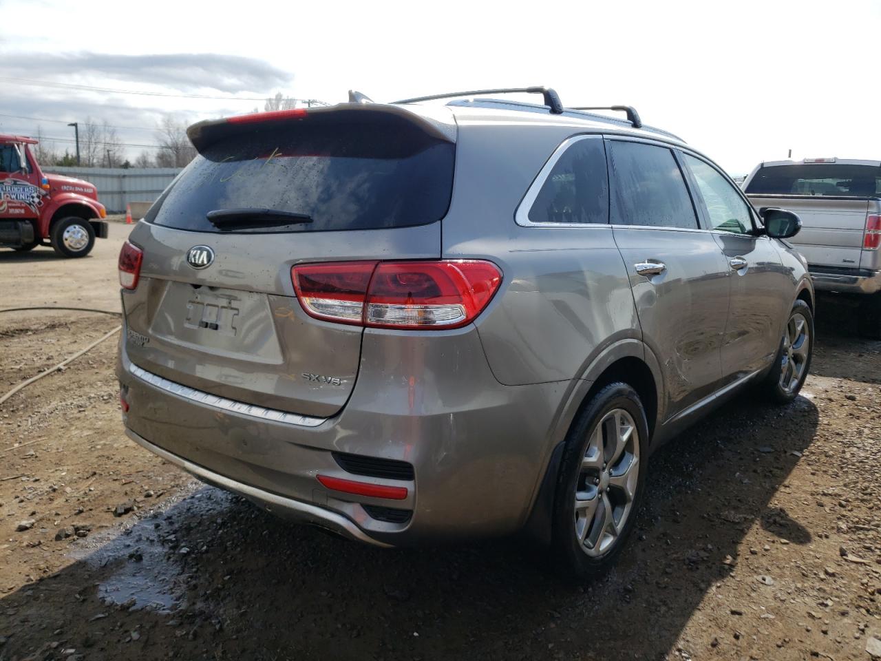 Photo 4 from auction – 2016 KIA SORENTO SX with VIN 5XYPKDA50GG089230