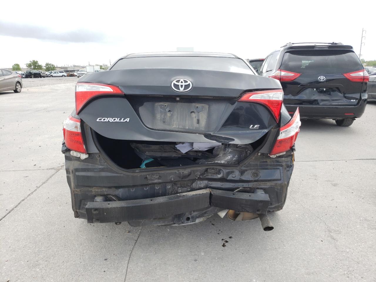 Photo 9 from auction – 2014 TOYOTA COROLLA L with VIN 5YFBURHE2EP141554