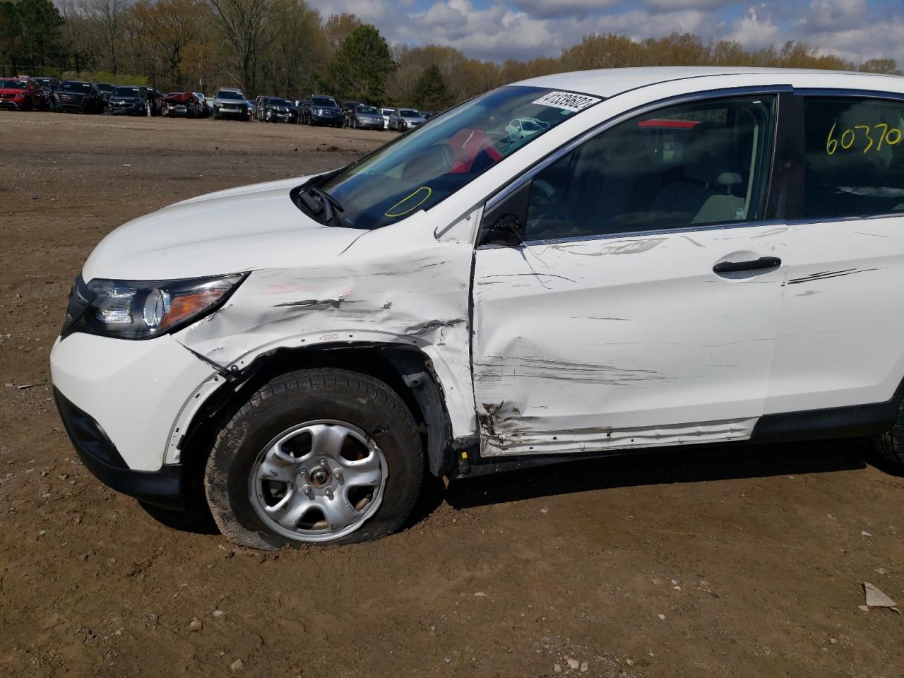 Photo 9 from auction – 2012 HONDA CR-V LX with VIN 2HKRM3H34CH515148