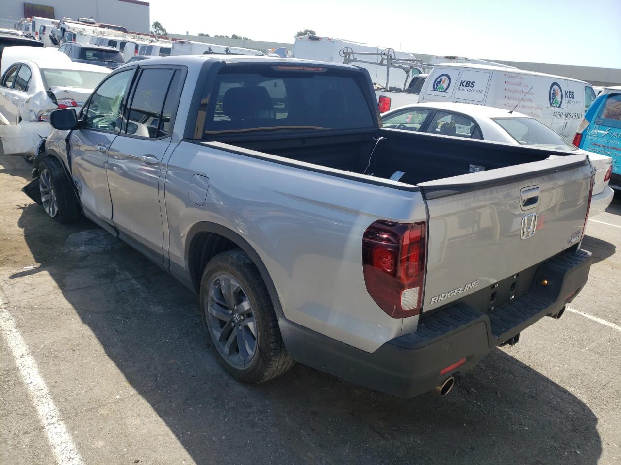Photo 3 from auction – 2022 HONDA RIDGELINE with VIN 5FPYK3F10NB007058