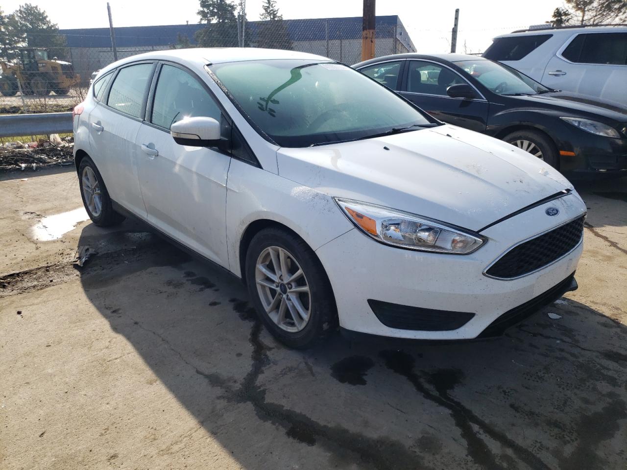 FORD FOCUS SE 2017 with VIN 1FADP3K23HL299092 - Photo from auction