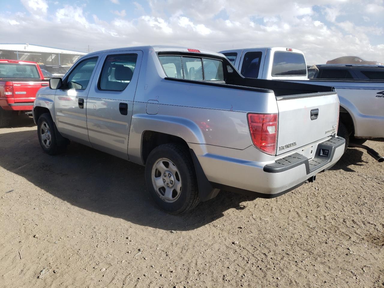 Photo 3 from auction – 2010 HONDA RIDGELINE with VIN 5FPYK1F22AB003763