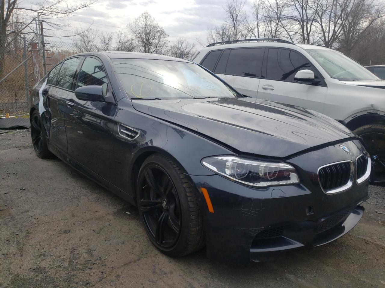 BMW M5 2015 with VIN WBSFV9C55FD595087 - Photo from auction