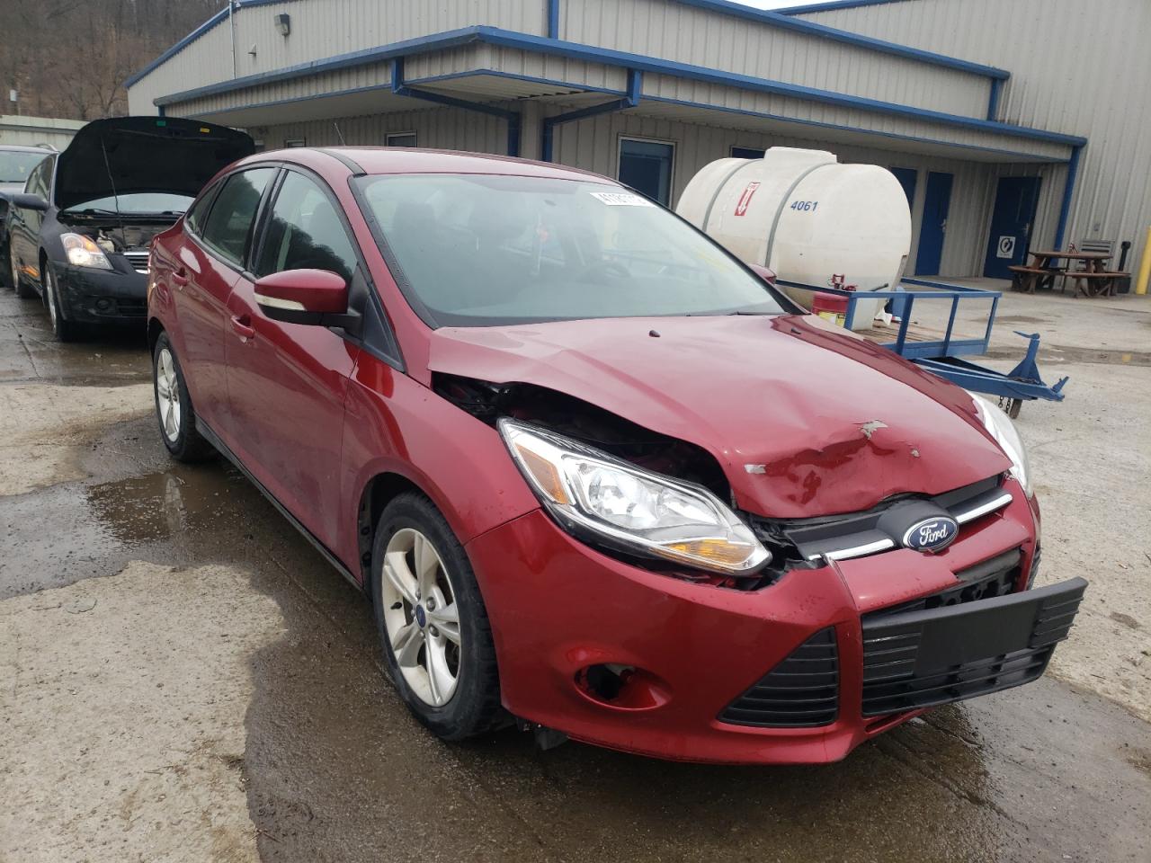 FORD FOCUS SE 2014 with VIN 1FADP3F27EL370378 - Photo from auction