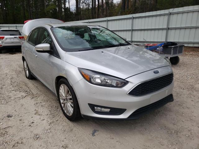 FORD FOCUS 2018 with VIN 1FADP3H2XJL318976 - Photo from auction