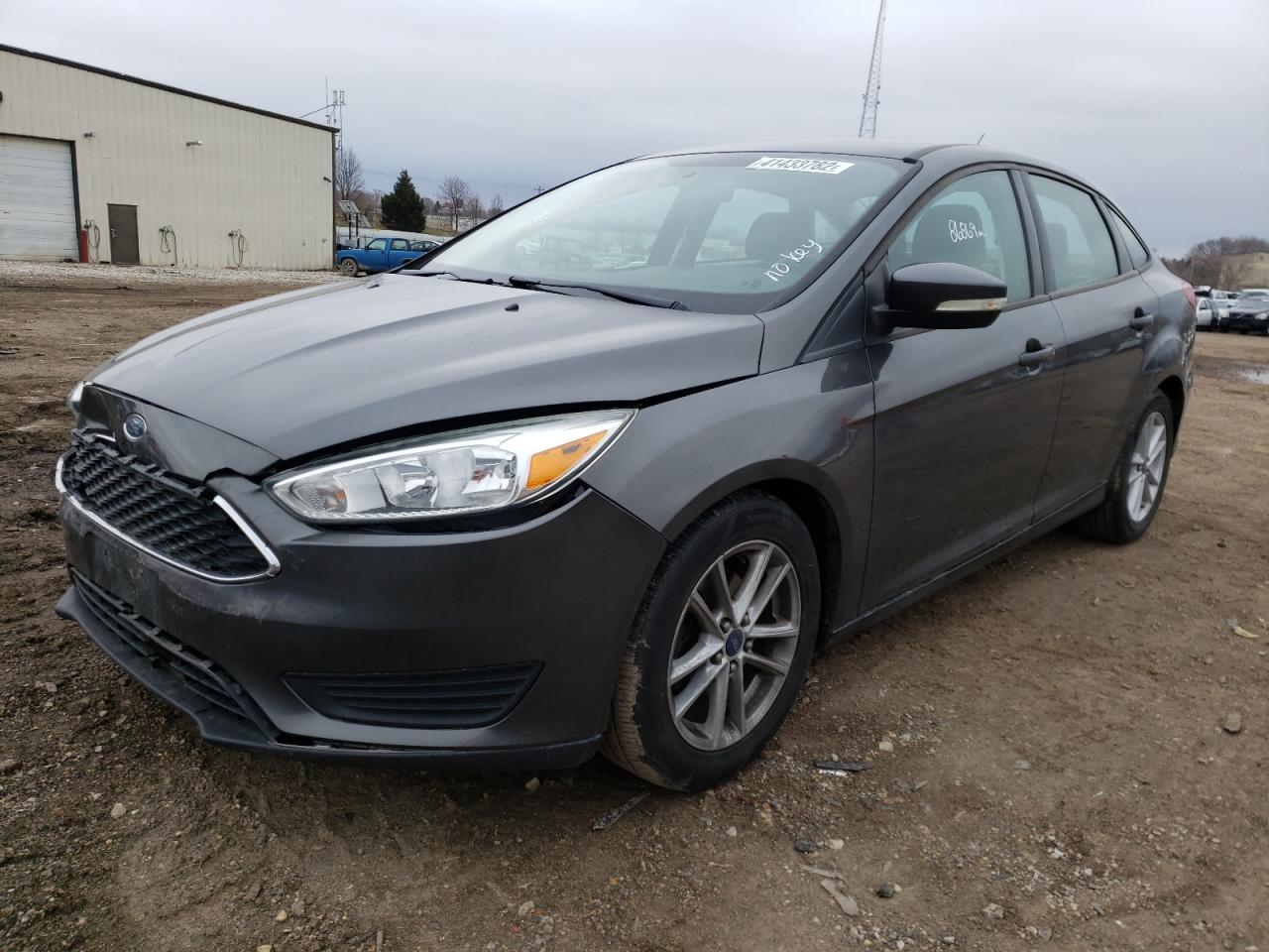 Photo 2 from auction – 2015 FORD FOCUS SE with VIN 1FADP3F23FL231317