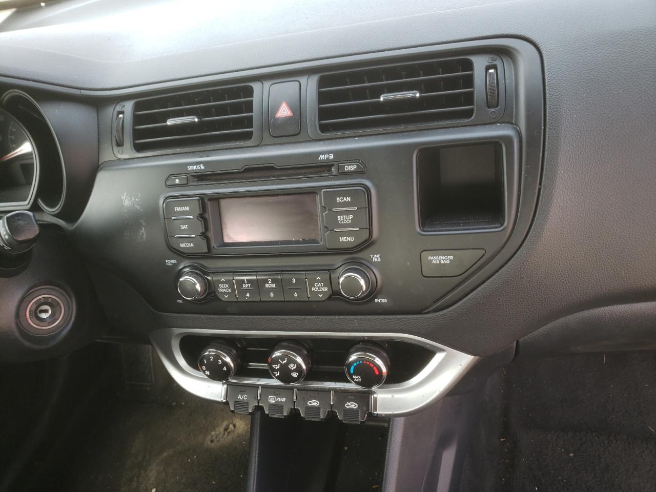 Photo 9 from auction – 2014 KIA RIO LX with VIN KNADM4A35E6415421