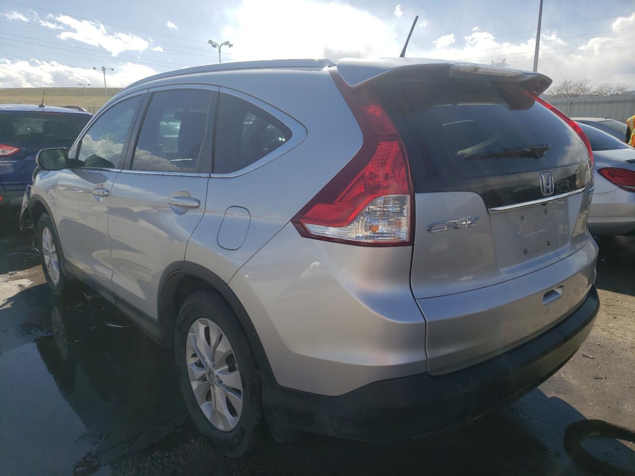 Photo 3 from auction – 2014 HONDA CR-V EXL with VIN 2HKRM4H73EH650990