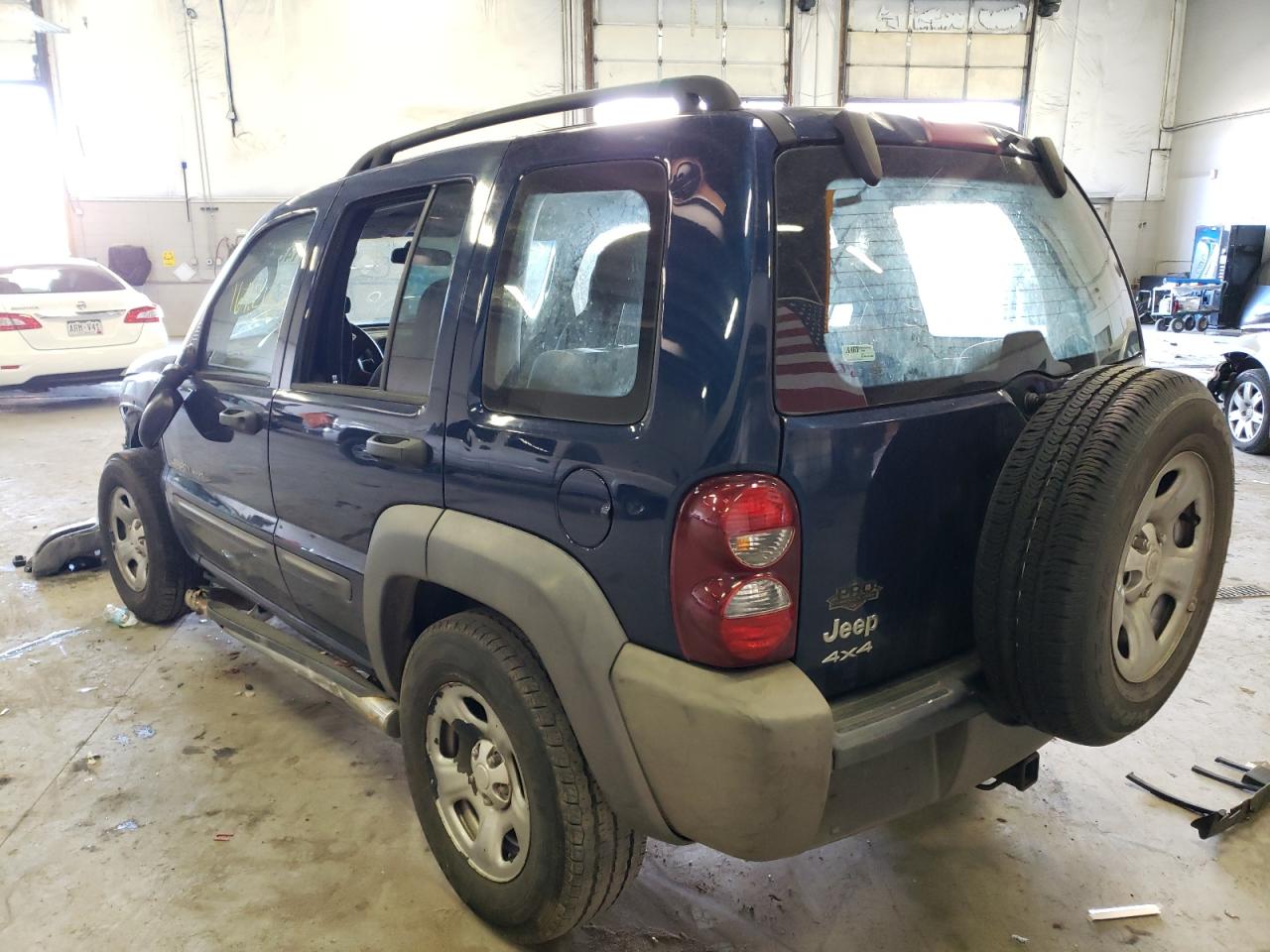 Photo 3 from auction – 2003 JEEP LIBERTY SP with VIN 1J4GL48K93W645826