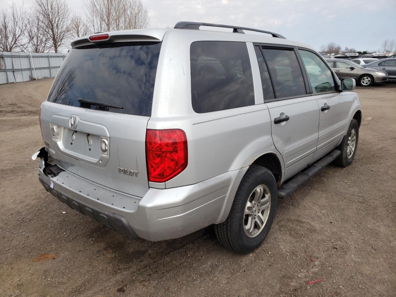 Photo 4 from auction – 2004 HONDA PILOT EX with VIN 2HKYF18454H574990