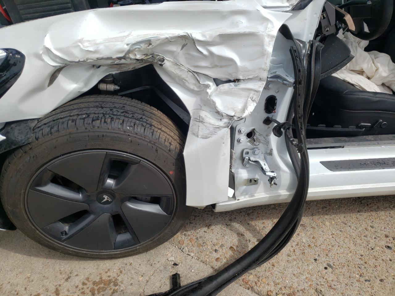 Photo 9 from auction – 2022 TESLA MODEL 3 with VIN 5YJ3E1EB6NF131618
