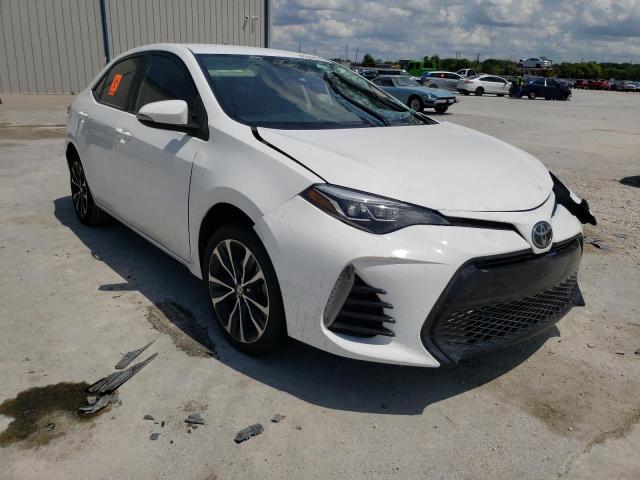 TOYOTA COROLLA L 2018 with VIN 5YFBURHE4JP839965 - Photo from auction
