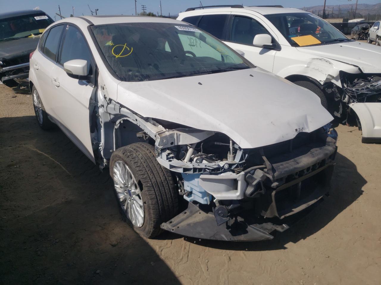 FORD FOCUS TITA 2012 with VIN 1FAHP3N21CL423334 - Photo from auction